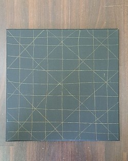 Canvas with loose grid lines.